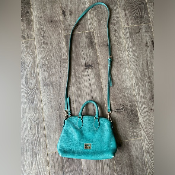 Dooney & Bourke Handbags - Dooney & Bourke real leather zippered cross body/ hand bag